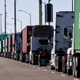 Trucks are lined up at the Port of Los Angeles on November 24, 2021 in San Pedro, California.